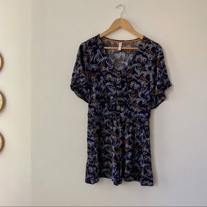 Blue Patterned Romper with a Peekaboo Waist